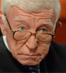 Henry Gibson em Justiça sem Limites